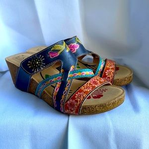 Slip on wedge sandals.